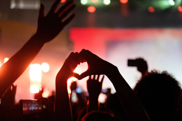 Hands making heart shape at music festival Festival FAV Colmar